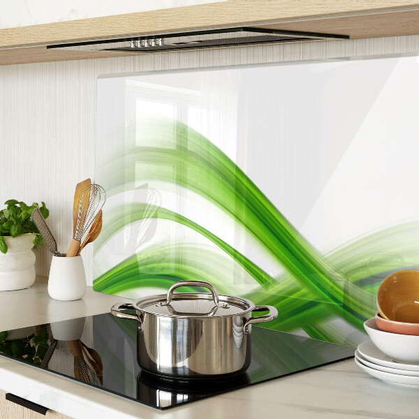 Tagliere in vetro con motivo di onde verdi astratte