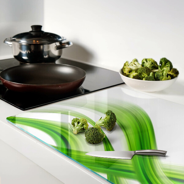 Tagliere in vetro con motivo di onde verdi astratte