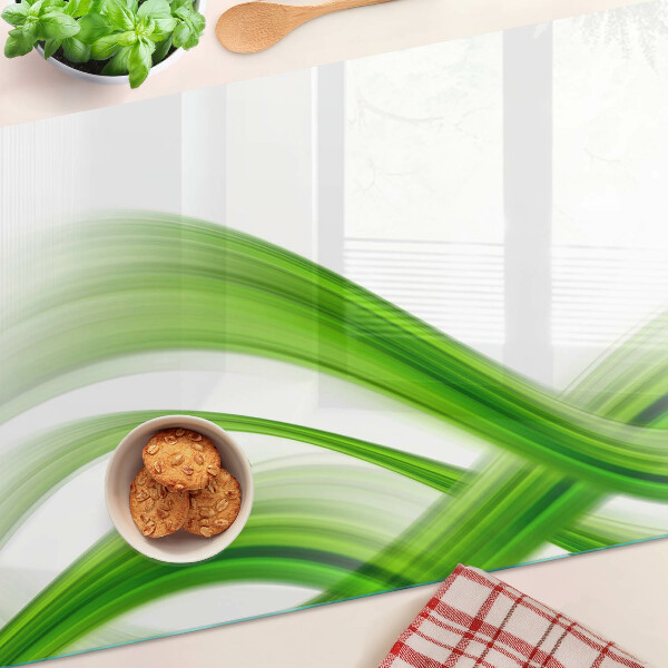 Tagliere in vetro con motivo di onde verdi astratte