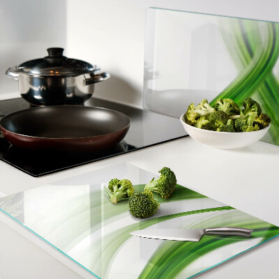 Tagliere in vetro con motivo di onde verdi astratte