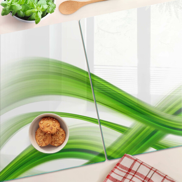 Tagliere in vetro con motivo di onde verdi astratte