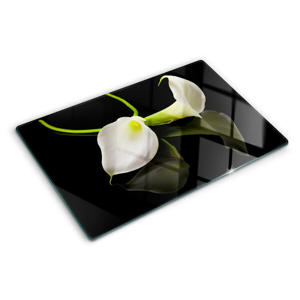 Tagliere in vetro con motivo a giglio su sfondo nero