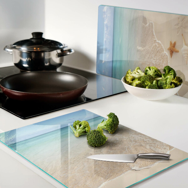 Tagliere in vetro temperato con motivo spiaggia con conchiglie e onde