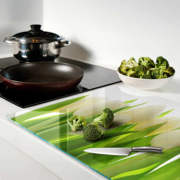 Tagliere in vetro temperato con stampa di tulipani su sfondo di foglie verdi