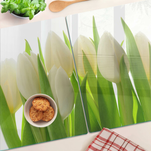 Tagliere in vetro temperato Tulipani sullo sfondo di foglie verdi