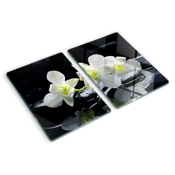 Tagliere in vetro temperato con motivo di orchidee su sfondo nero