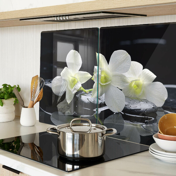 Tagliere in vetro temperato con motivo di orchidee su sfondo nero