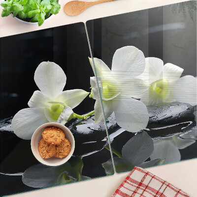 Tagliere in vetro temperato con motivo di orchidee su sfondo nero