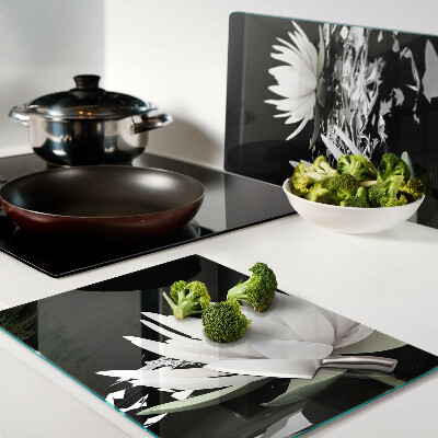 Tagliere in vetro temperato con motivo di ninfee su sfondo nero