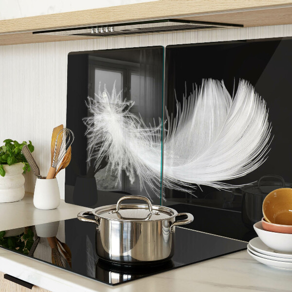 Tagliere in vetro temperato con motivo a piuma su sfondo nero