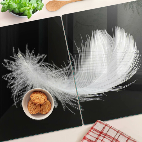Tagliere in vetro temperato con motivo a piuma su sfondo nero