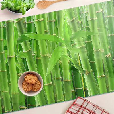 Tagliere in vetro con motivo di foglie e fusti di bamboo