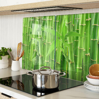 Tagliere in vetro con motivo di foglie e fusti di bamboo