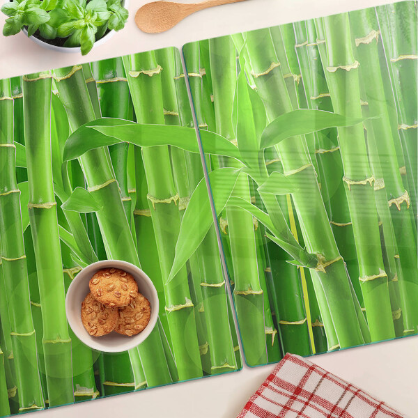 Tagliere in vetro con motivo di foglie e fusti di bamboo