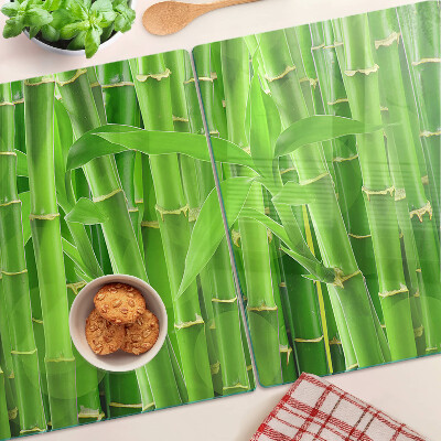 Tagliere in vetro con motivo di foglie e fusti di bamboo