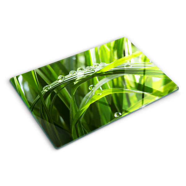 Tagliere in vetro temperato con stampa a motivo di gocce d'acqua sull'erba