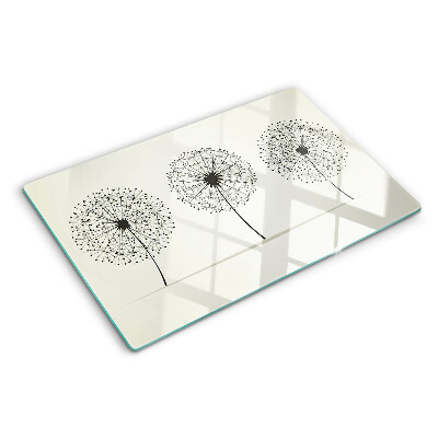 Tagliere in vetro temperato con motivo di denti di leone su sfondo bianco