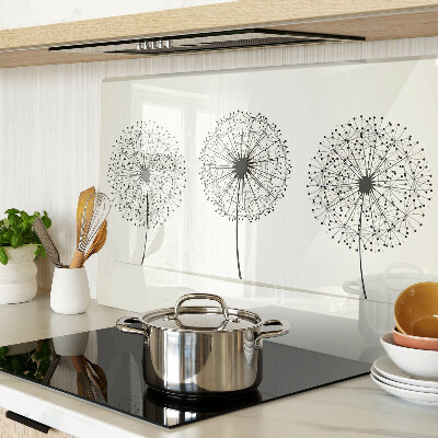 Tagliere in vetro temperato con motivo di denti di leone su sfondo bianco