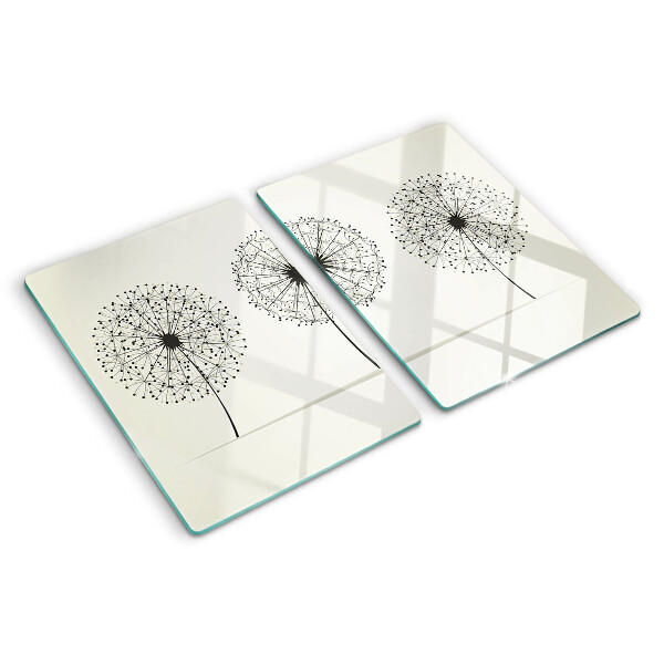 Tagliere in vetro temperato con motivo di denti di leone su sfondo bianco