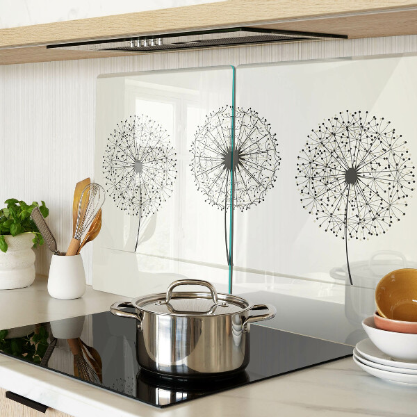 Tagliere in vetro temperato con motivo di denti di leone su sfondo bianco