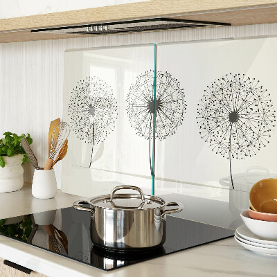 Tagliere in vetro temperato con motivo di denti di leone su sfondo bianco