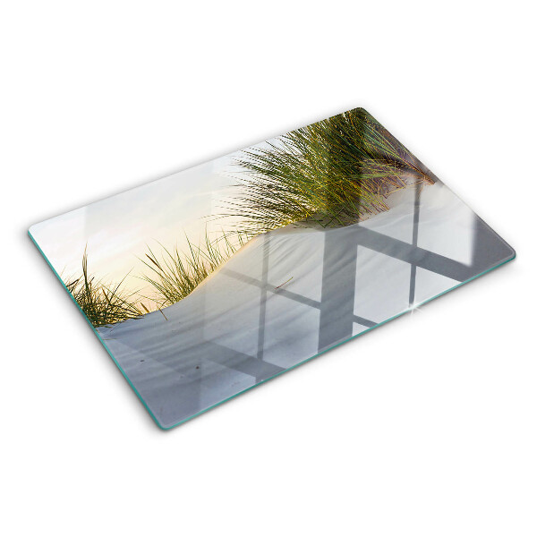 Tagliere in vetro con motivo di erba verde su sfondo cielo