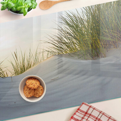 Tagliere in vetro con motivo di erba verde su sfondo cielo