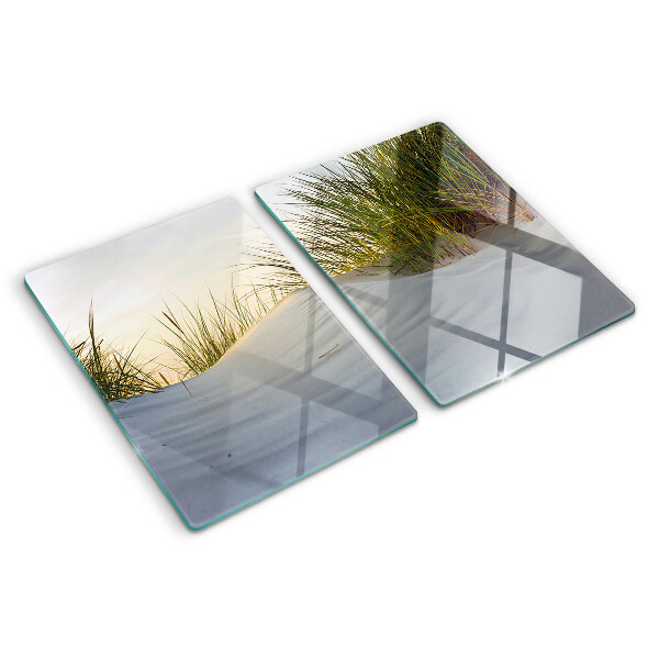 Tagliere in vetro con motivo di erba verde su sfondo cielo