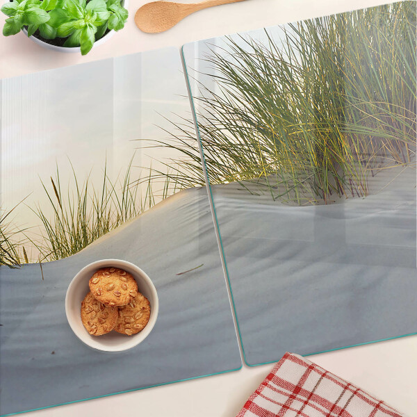 Tagliere in vetro con motivo di erba verde su sfondo cielo