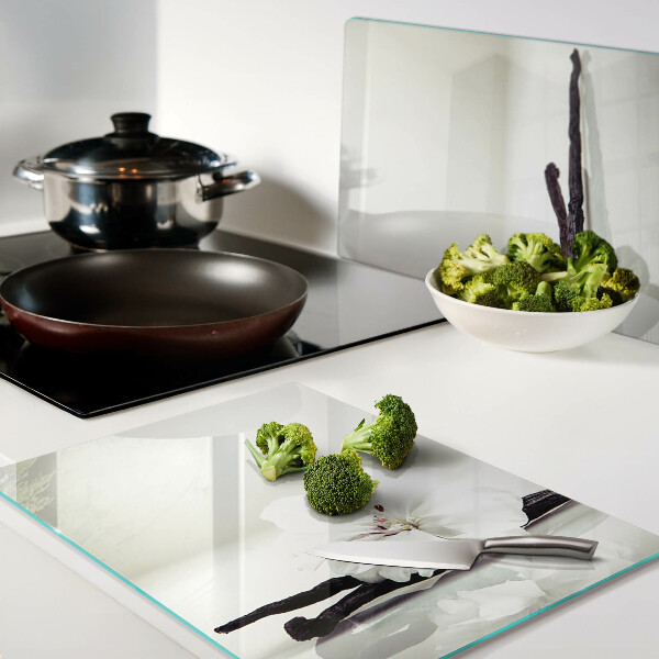 Tagliere in vetro con motivo a fiore su ramo