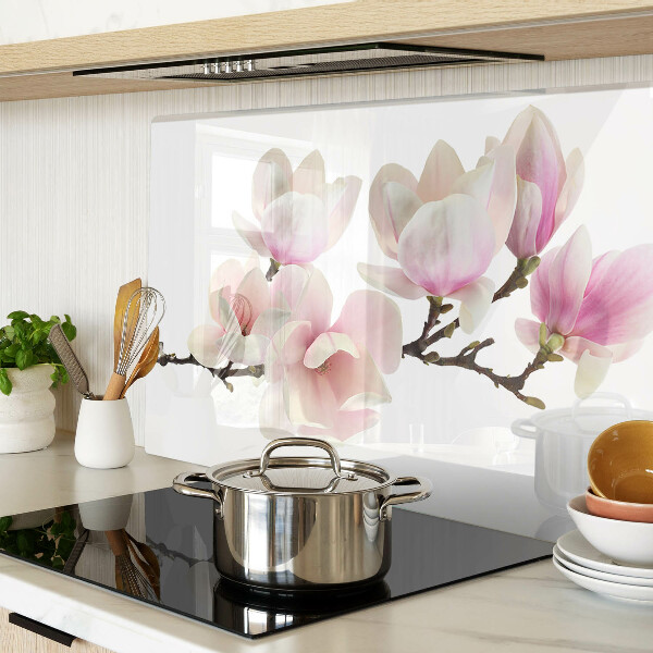 Tagliere in vetro con decorazione con fiori di magnolia su ramo