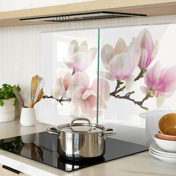 Tagliere in vetro con decorazione con fiori di magnolia su ramo