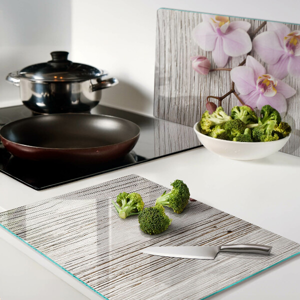 Tagliere in vetro temperato Orchidee su sfondo di legno
