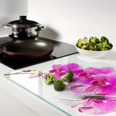 Tagliere in vetro temperato con decorazione di orchidee nei toni del rosa