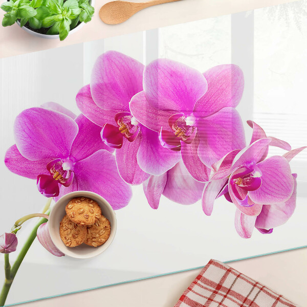 Tagliere in vetro temperato con decorazione di orchidee nei toni del rosa