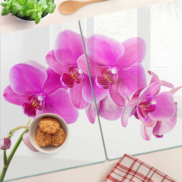 Tagliere in vetro temperato con decorazione di orchidee nei toni del rosa