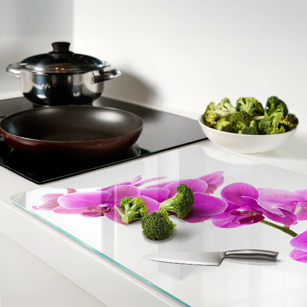 Tagliere in vetro temperato con motivo di fiori di orchidea nei toni del rosa