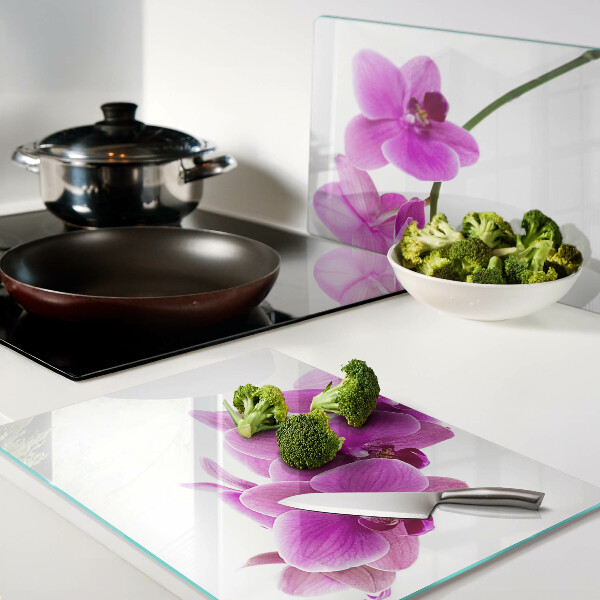 Tagliere in vetro temperato con motivo di fiori di orchidea nei toni del rosa