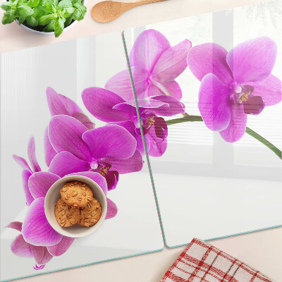 Tagliere in vetro temperato con motivo di fiori di orchidea nei toni del rosa