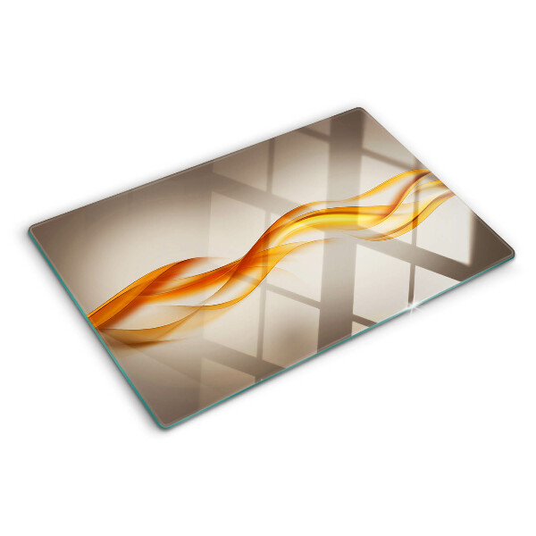 Tagliere in vetro temperato con decorazione a onde nei toni dell'oro