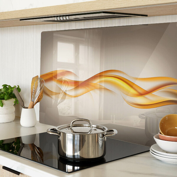 Tagliere in vetro temperato con decorazione a onde nei toni dell'oro