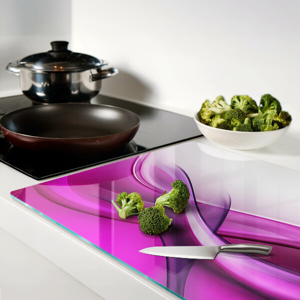 Tagliere in vetro temperato con motivo a onde nei toni del rosa