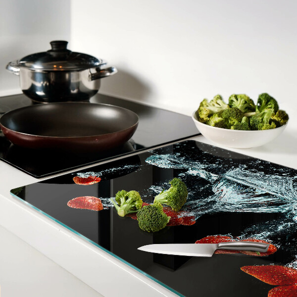 Tagliere in vetro con motivo di fragole immerse in acqua