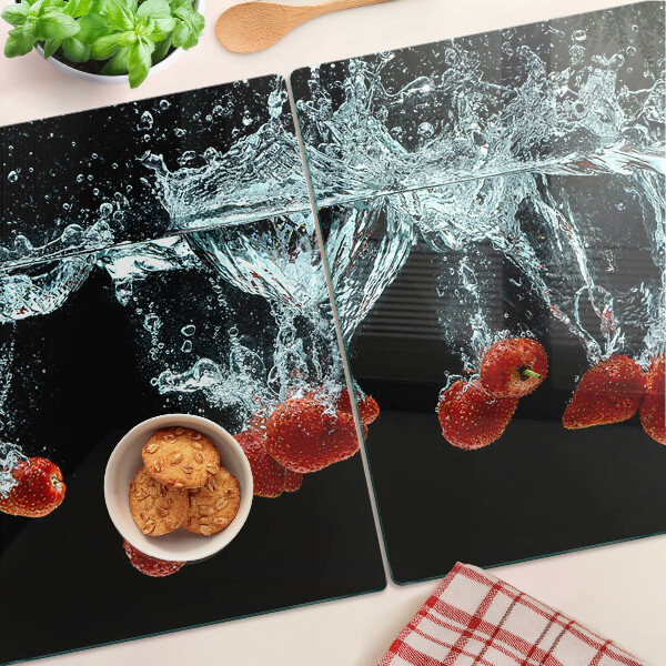 Tagliere in vetro con motivo di fragole immerse in acqua