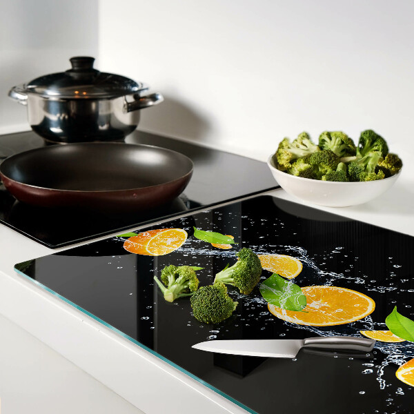 Tagliere in vetro temperato con motivo di agrumi immersi in acqua