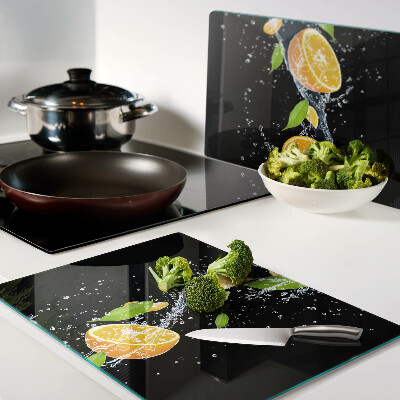 Tagliere in vetro temperato con motivo di agrumi immersi in acqua