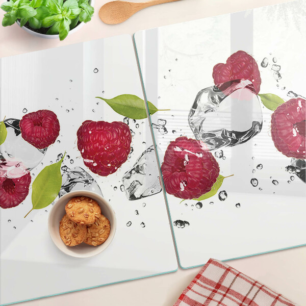 Tagliere in vetro con motivo di fragole su sfondo ghiacciato