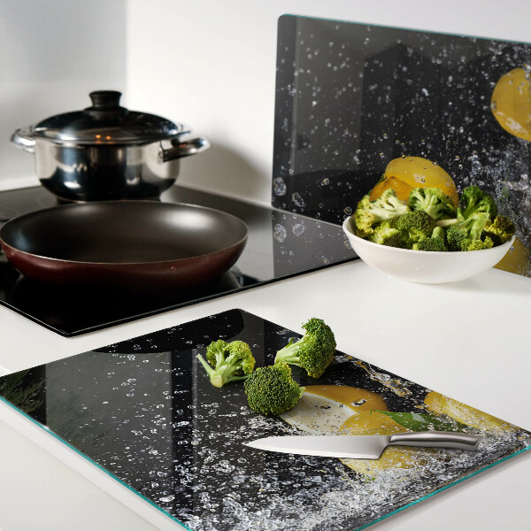 Tagliere in vetro con motivo di limoni in acqua