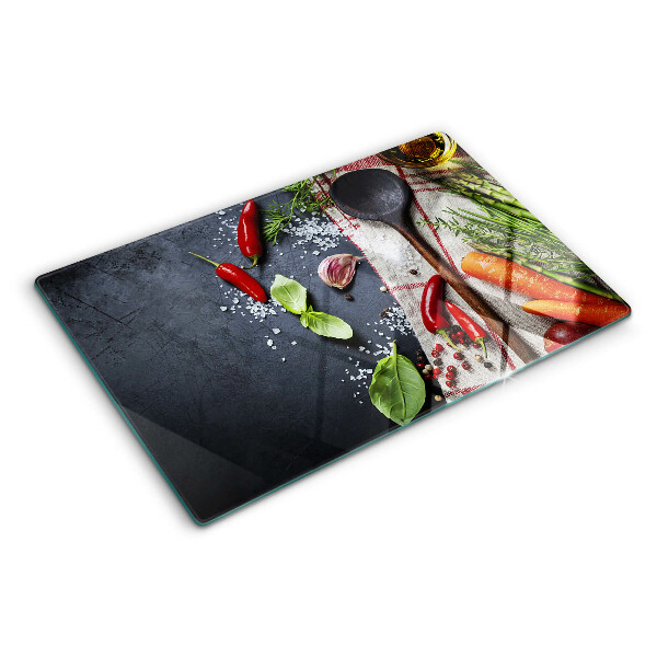 Tagliere in vetro con decorazione a tema spezie e verdure