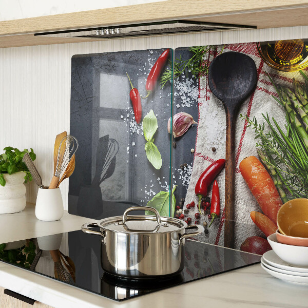 Tagliere in vetro con decorazione a tema spezie e verdure